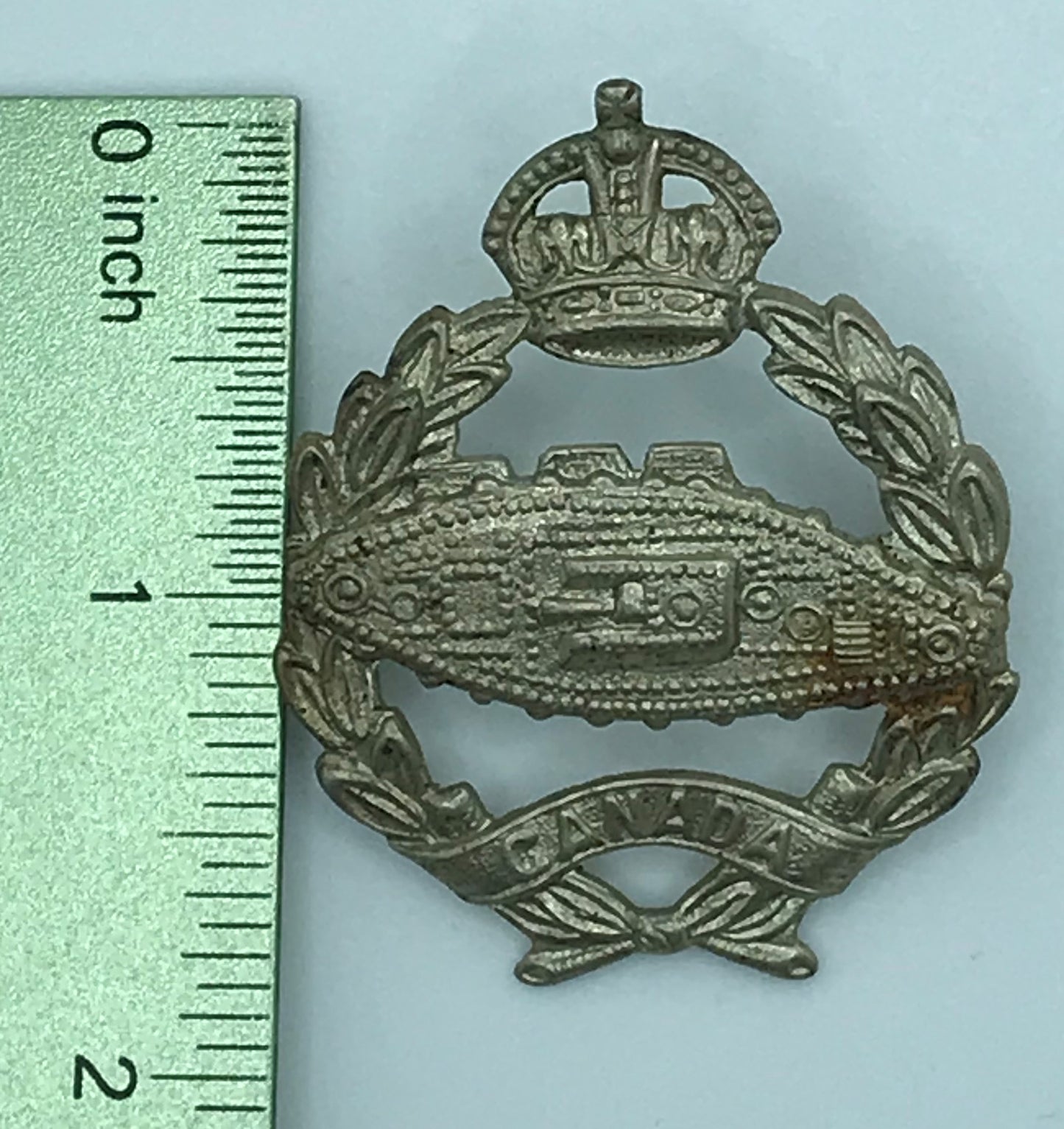 Mi12- Canadian Armoured Corps Cap Badge